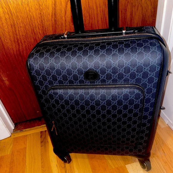 Brand new never used Black Gucci carryon luggage with wheels. - Picture 1 of 7
